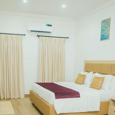 Quest Boutique Hotel Gwarinpa Экстерьер фото