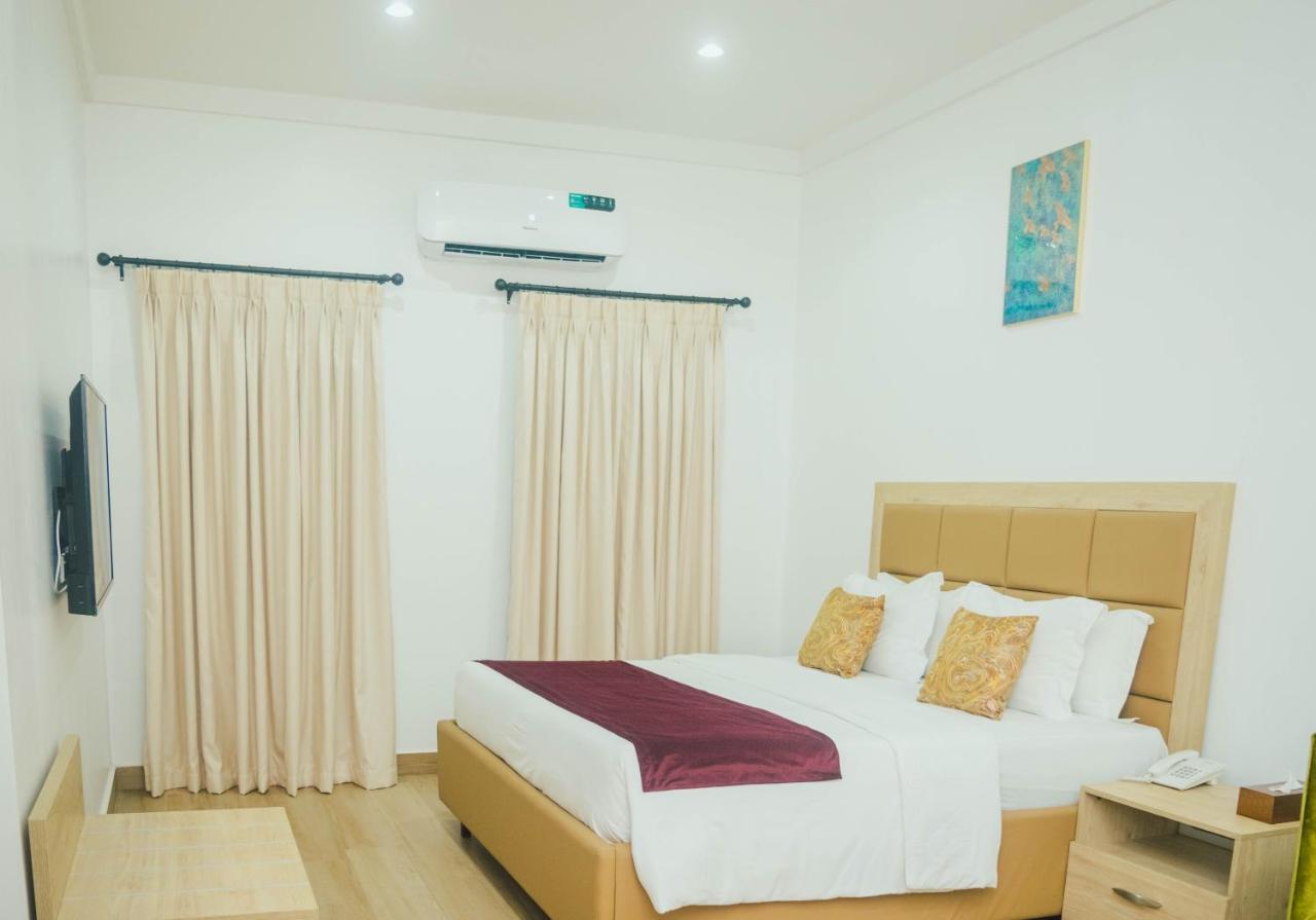 Quest Boutique Hotel Gwarinpa Экстерьер фото
