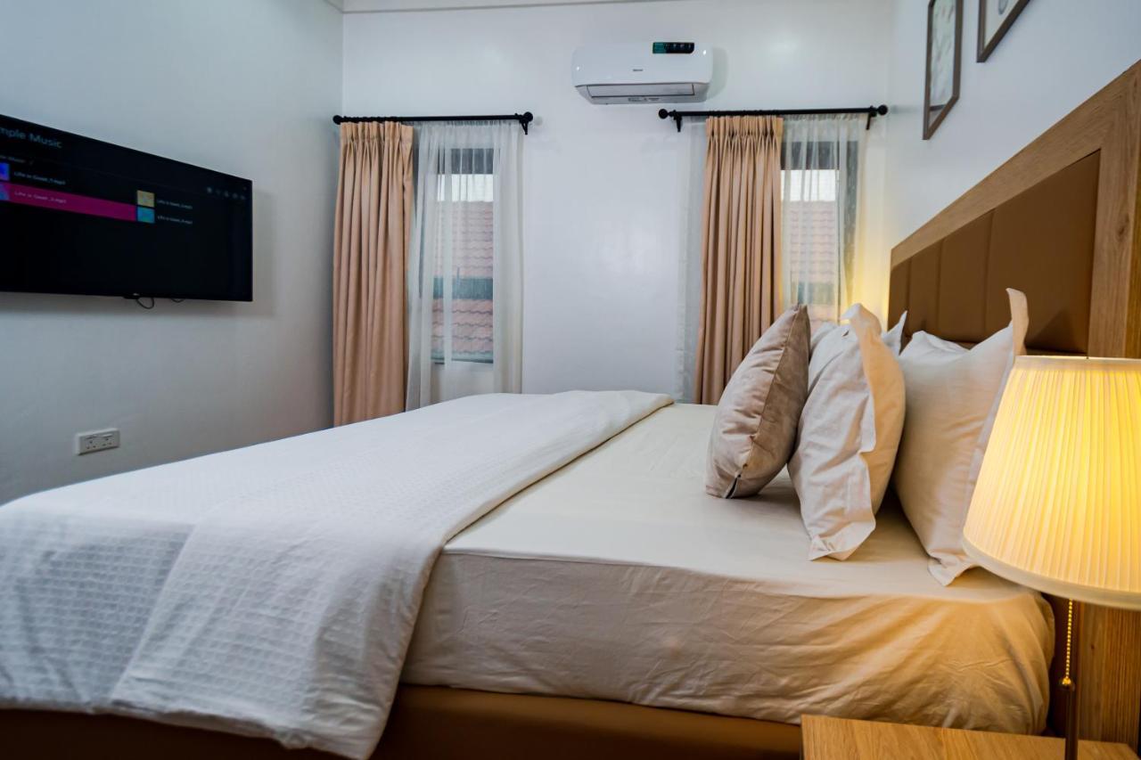 Quest Boutique Hotel Gwarinpa Экстерьер фото