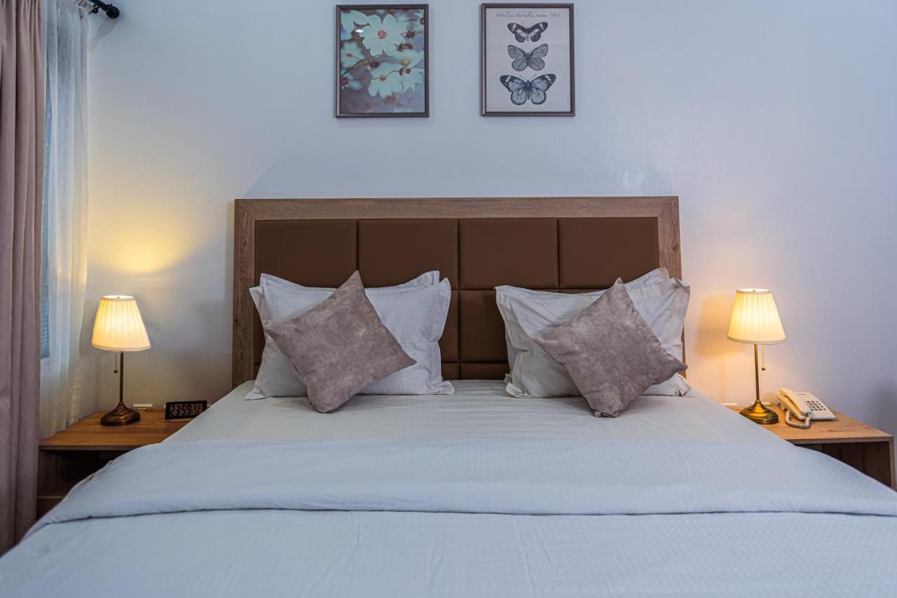 Quest Boutique Hotel Gwarinpa Экстерьер фото