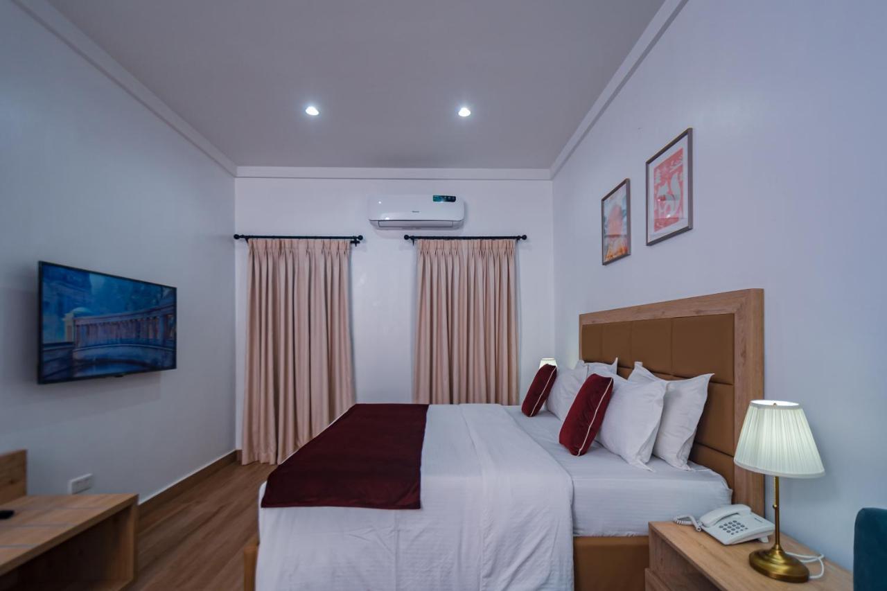 Quest Boutique Hotel Gwarinpa Экстерьер фото
